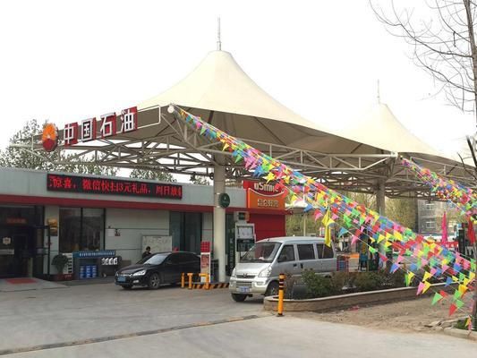 加油站罩棚屬于什么結構(加油站罩棚的結構形式) 結構地下室施工 第1張 加油站罩棚屬于什么結構(加油站罩棚的結構形式) 結構地下室施工 第1張
