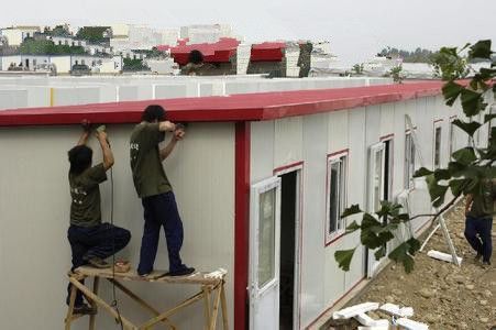 彩鋼房搭建視頻（彩鋼房地基處理要點） 鋼結構跳臺施工 第5張